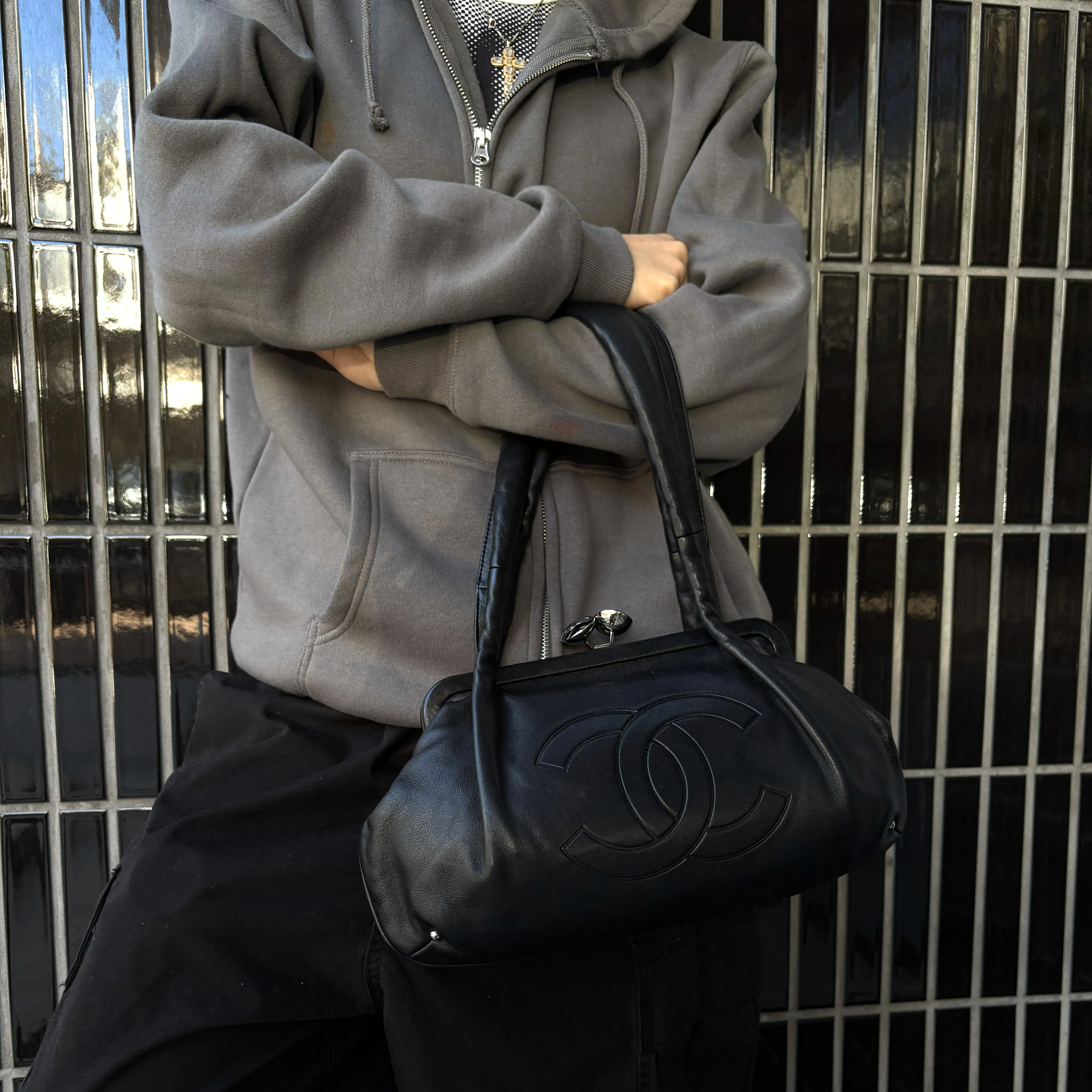 Chanel Black Lambskin Kiss Lock Handbag